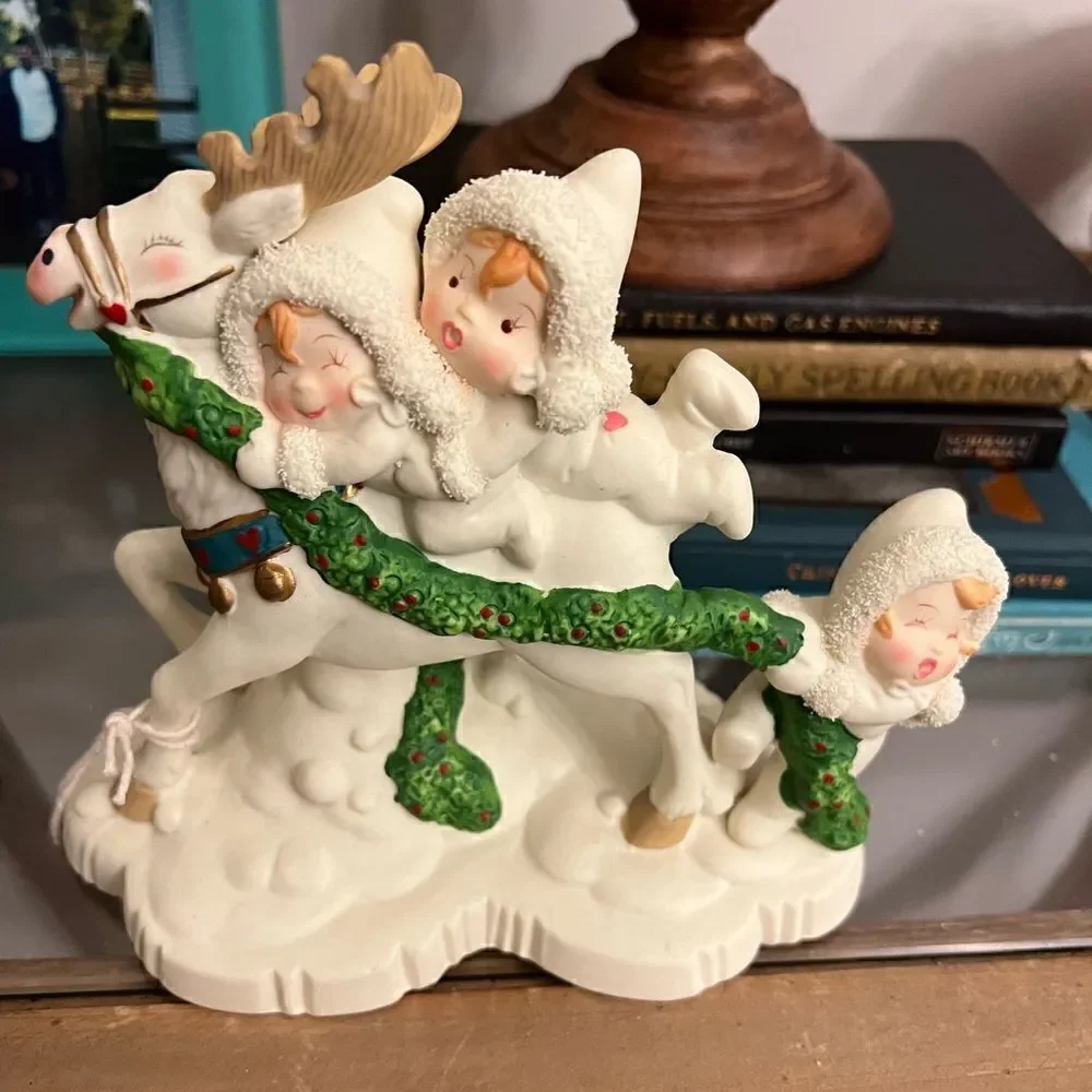 Christmas Vintage Tykes on Ice Magical Ride Porcelain Figurine.